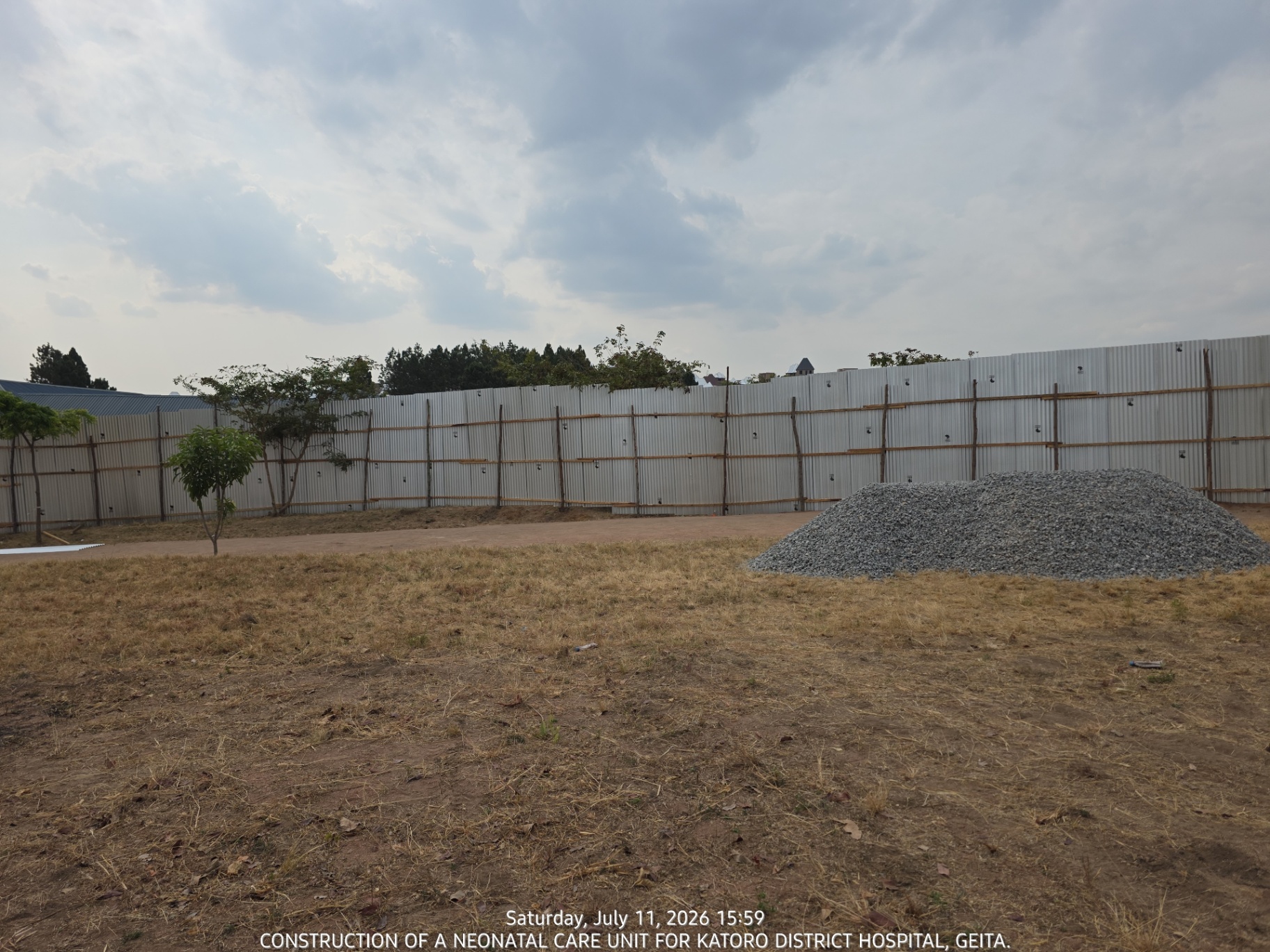 Cleared site with aggregate stockpile ready for works